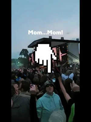 Seems more interested in waving to his Mom rather than enjoying Oasis.